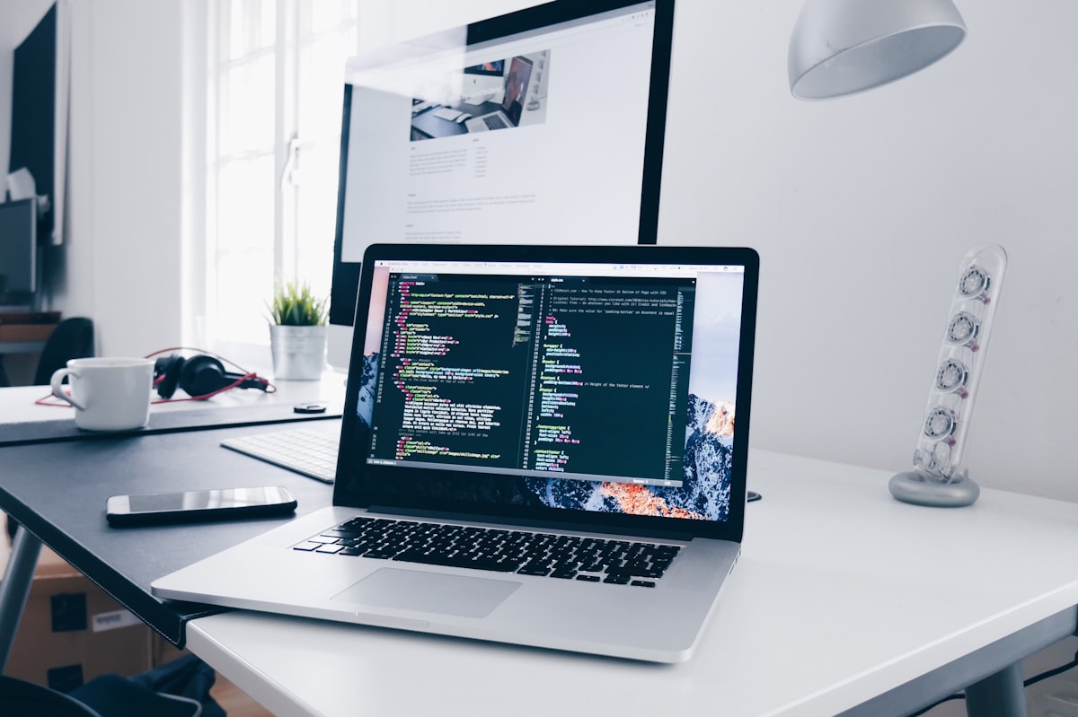 WordPress developer working on a custom website design at a modern workspace