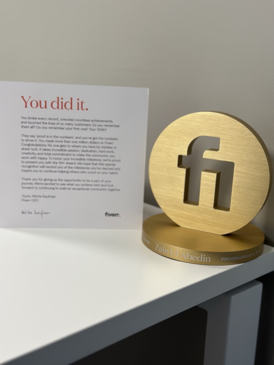 Fiverr Millionaire trophy and CEO letter from Micha Kaufman on my desk